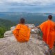 Monks on a cliff on Bokor, Kampot in Cambodia