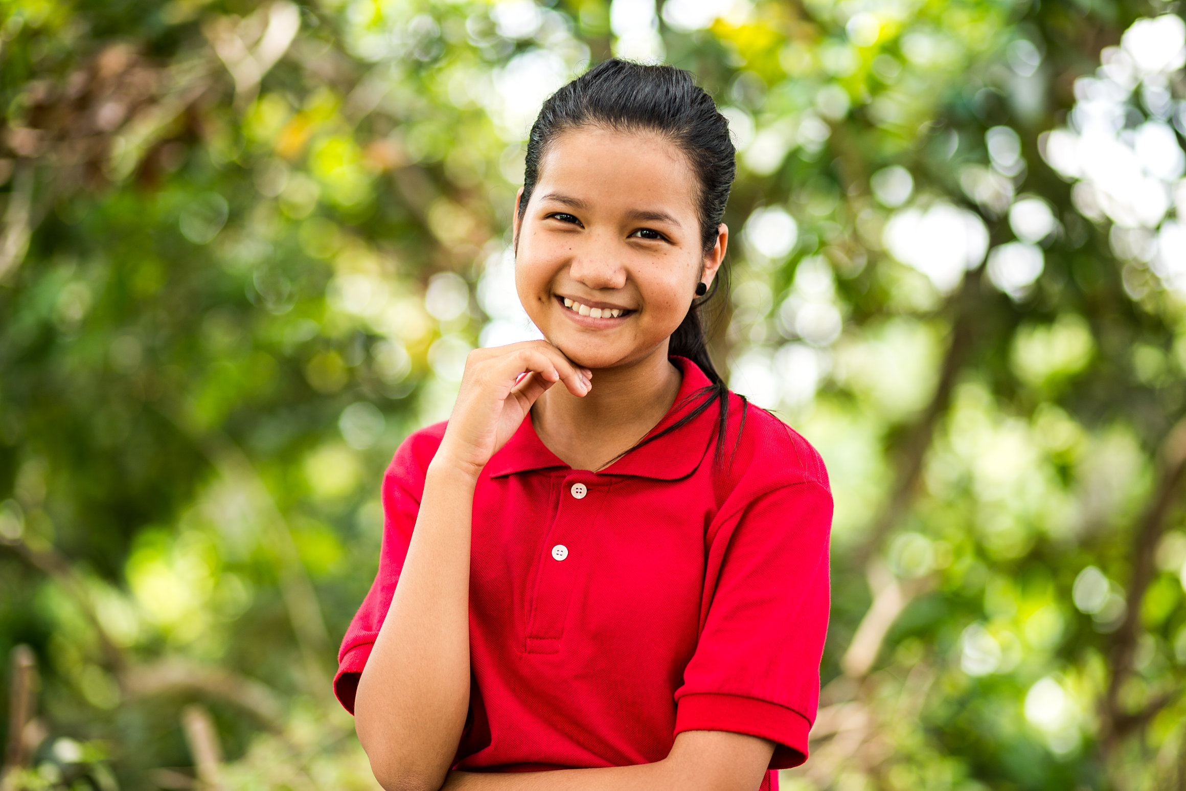Portrait of a smiling girl attending Liger NGO in Phnom Penh, Cambodia