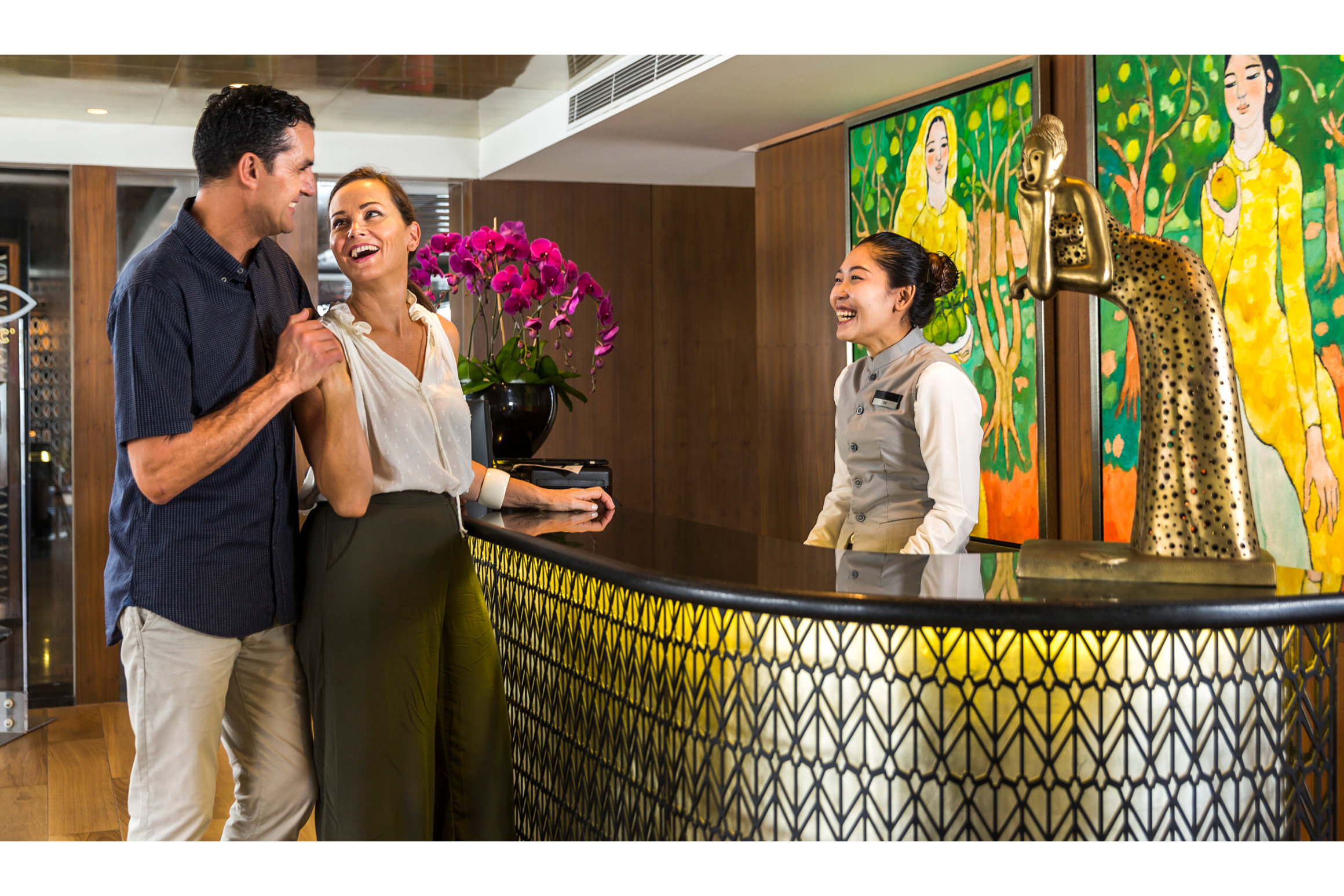 Luxury reception counter and tourists on Scenic Cruises in Cambodia